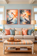 Coastal pelican wall art set of two printable tropical bird prints digital download displayed above a sofa in a bright beach style living room