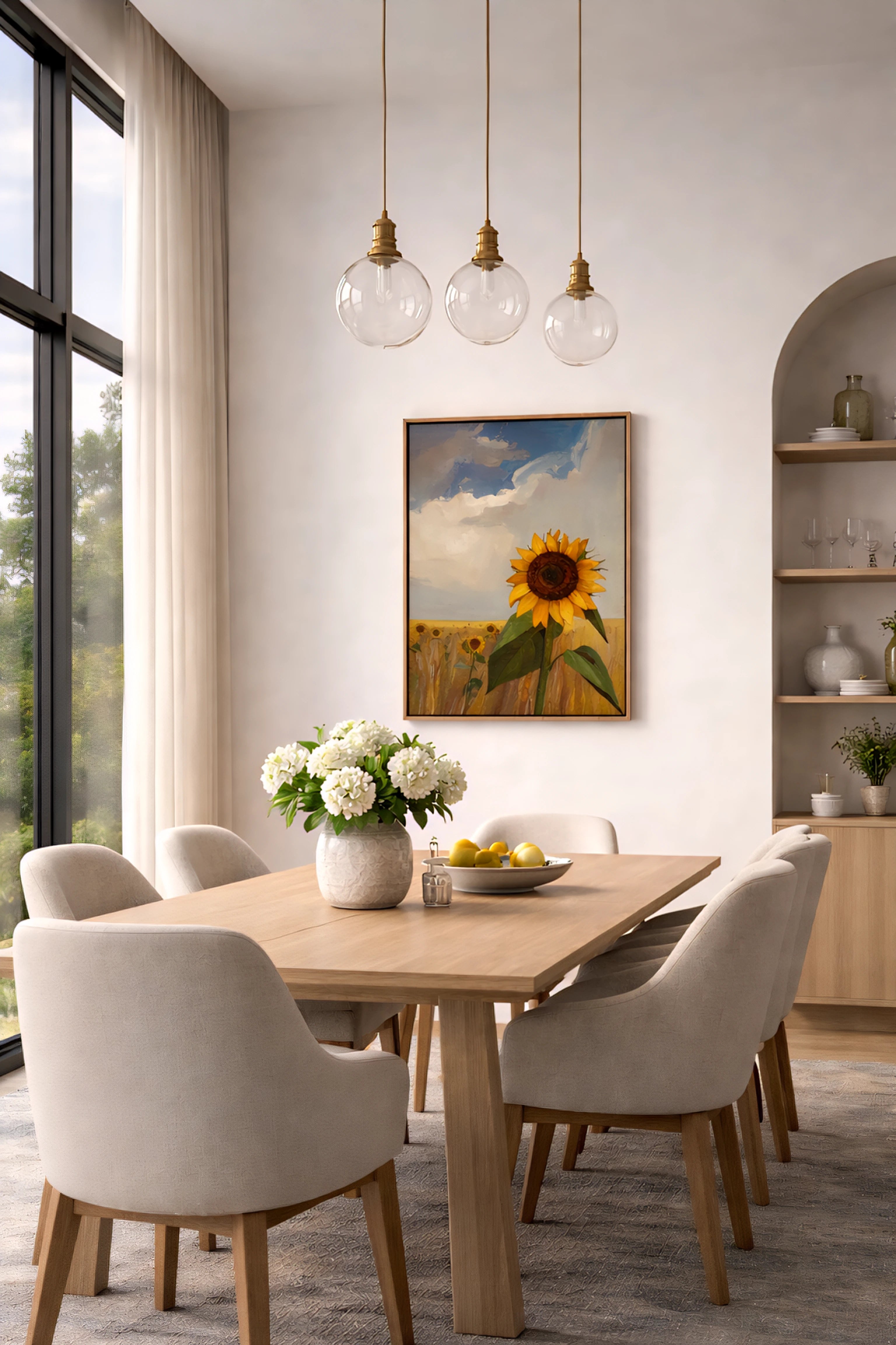 Savvy Places sunflower wall art print in a bright field scene styled above a dining table in a light-filled modern dining room.