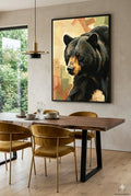 Black bear wall art in modern dining room with wood table, upholstered chairs, and neutral minimalist decor