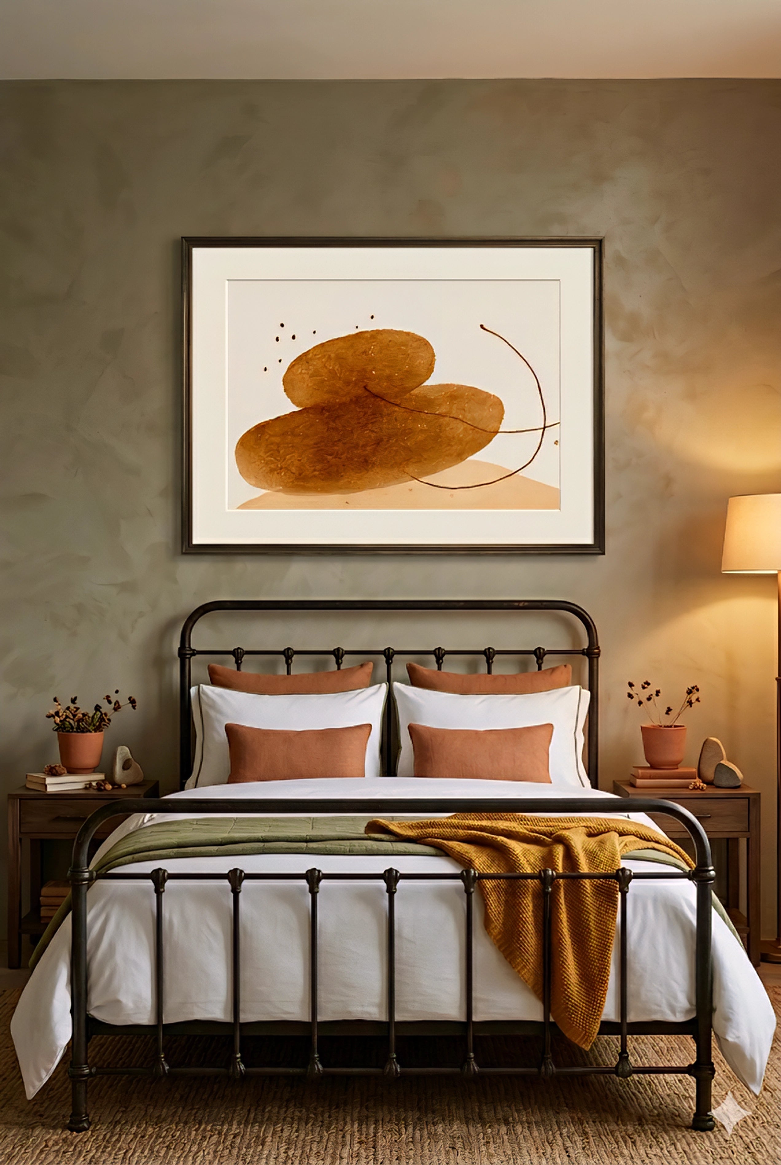 Neutral abstract wall art printable above metal bed in warm earth tone bedroom with beige walls and minimalist decor