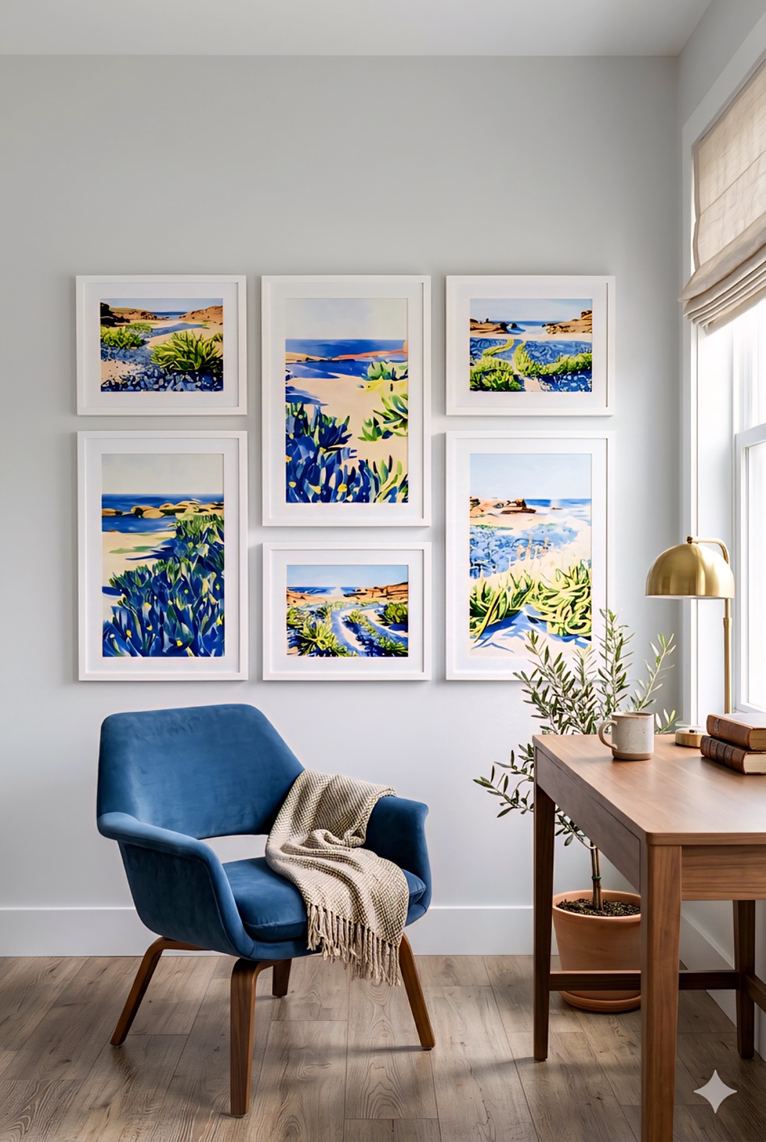 Savvy places coastal gallery wall printable art bundle with blue seascape prints in white frames styled in a modern home office creating a calm cohesive workspace decor layout