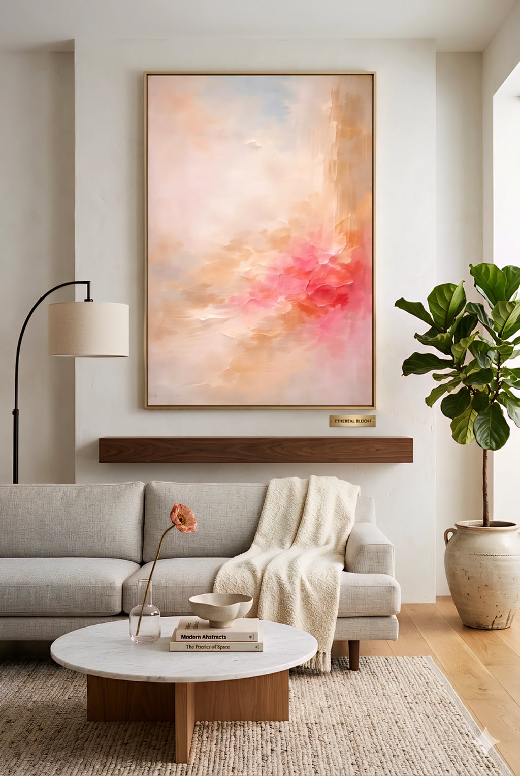 Modern neutral living room with coral abstract downloadable wall art above sofa, soft beige tones, wood accents, cozy textures, and minimalist decor styling