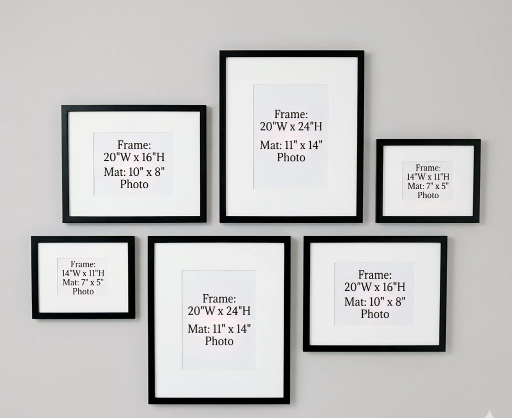 Set of black picture frames with dimensions labeled on a gray wall.