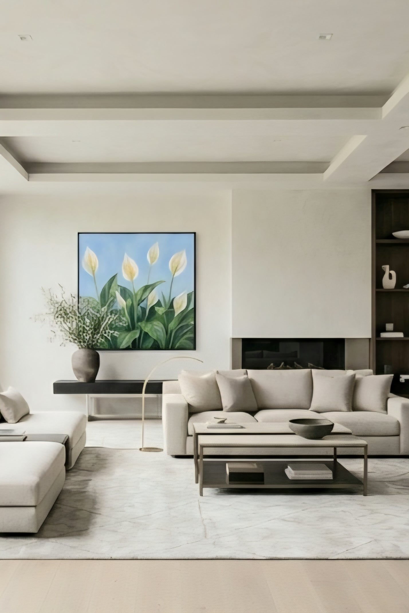 Framed peace lily botanical wall art with white blooms and green leaves on a blue background styled above a sofa in a modern neutral living room, printable digital download