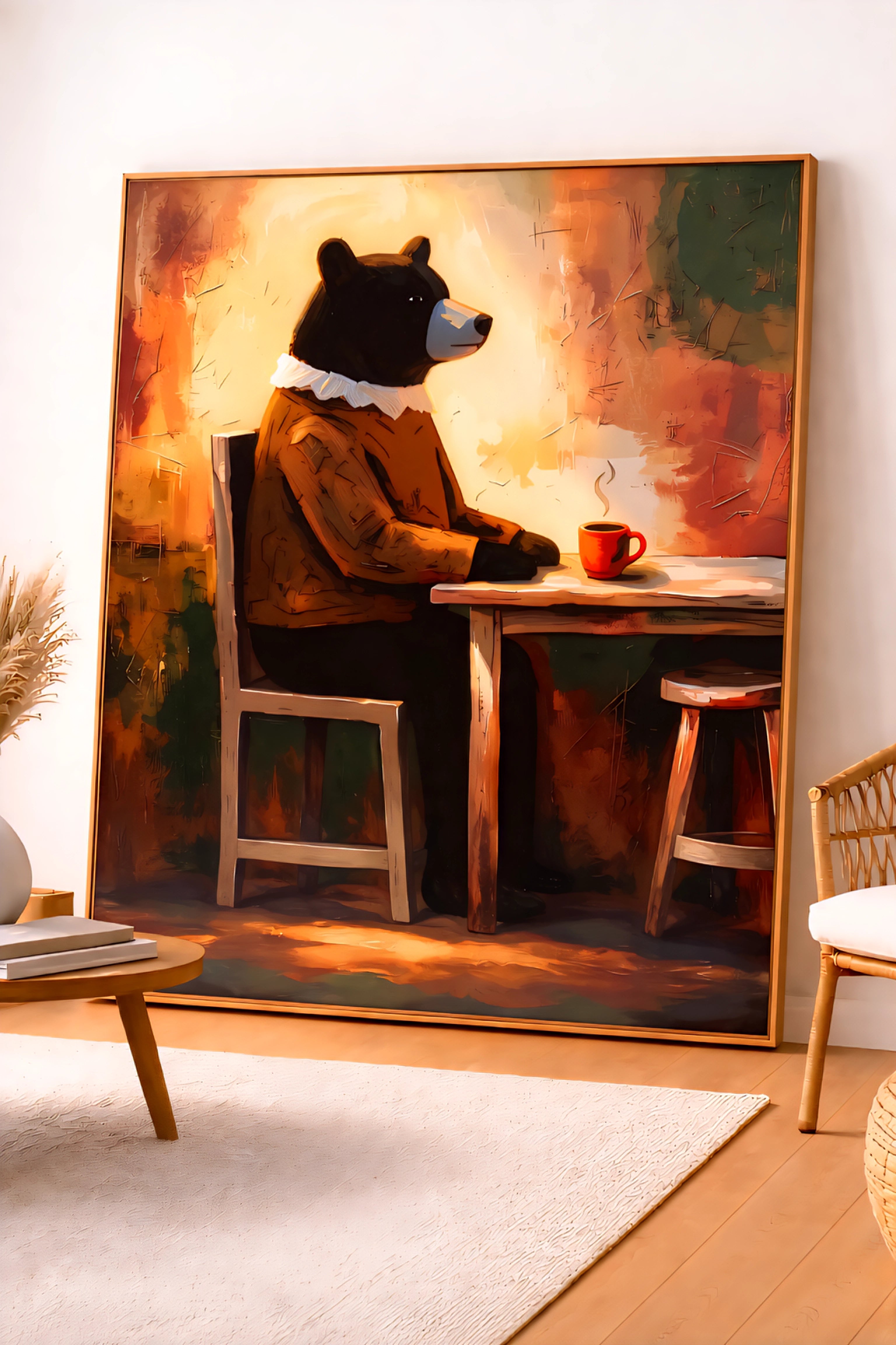 Framed Large bear wall art print leaning on floor, modern animal cafe illustration with warm abstract tones in minimalist neutral living room decor