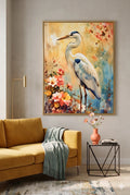 Great blue heron wall art print styled in a modern living room with a mustard sofa, neutral walls, and minimal decor, featuring a vibrant floral watercolor bird artwork that adds color and elegance, perfect oversized statement art for contemporary, modern traditional, and cozy living room decor, digital download printable in multiple ratios for flexible wall styling