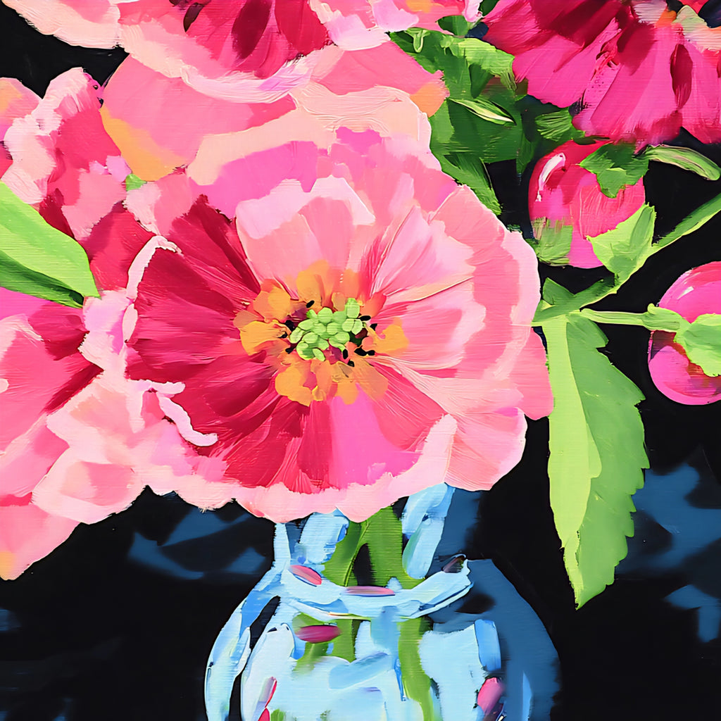 Colorful floral arrangement with pink flowers and green leaves on a black background