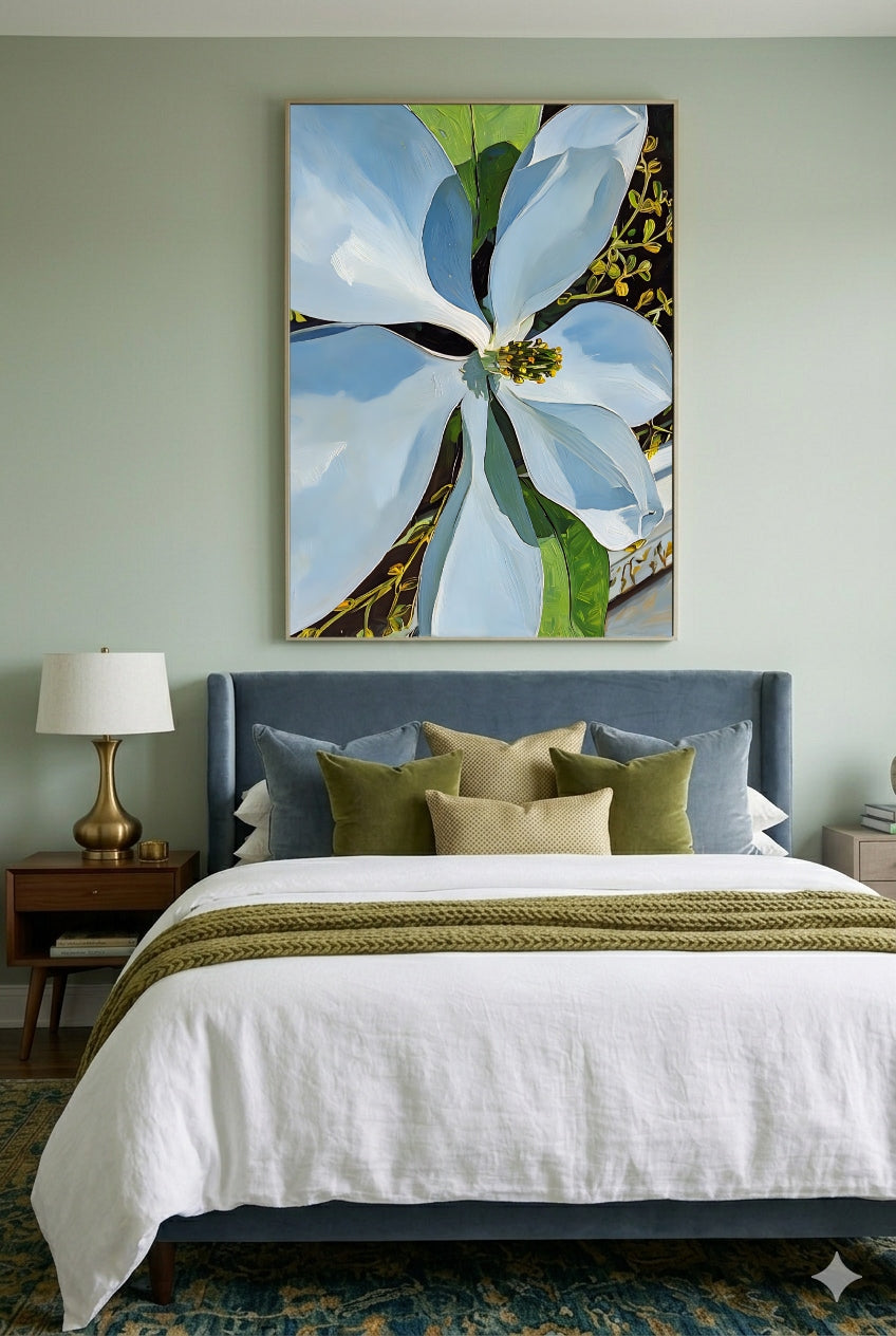 Magnolia wall art printable above bed in modern bedroom, large white floral artwork with green accents, botanical digital download, stylish bedroom decor with soft neutral tones and layered pillows