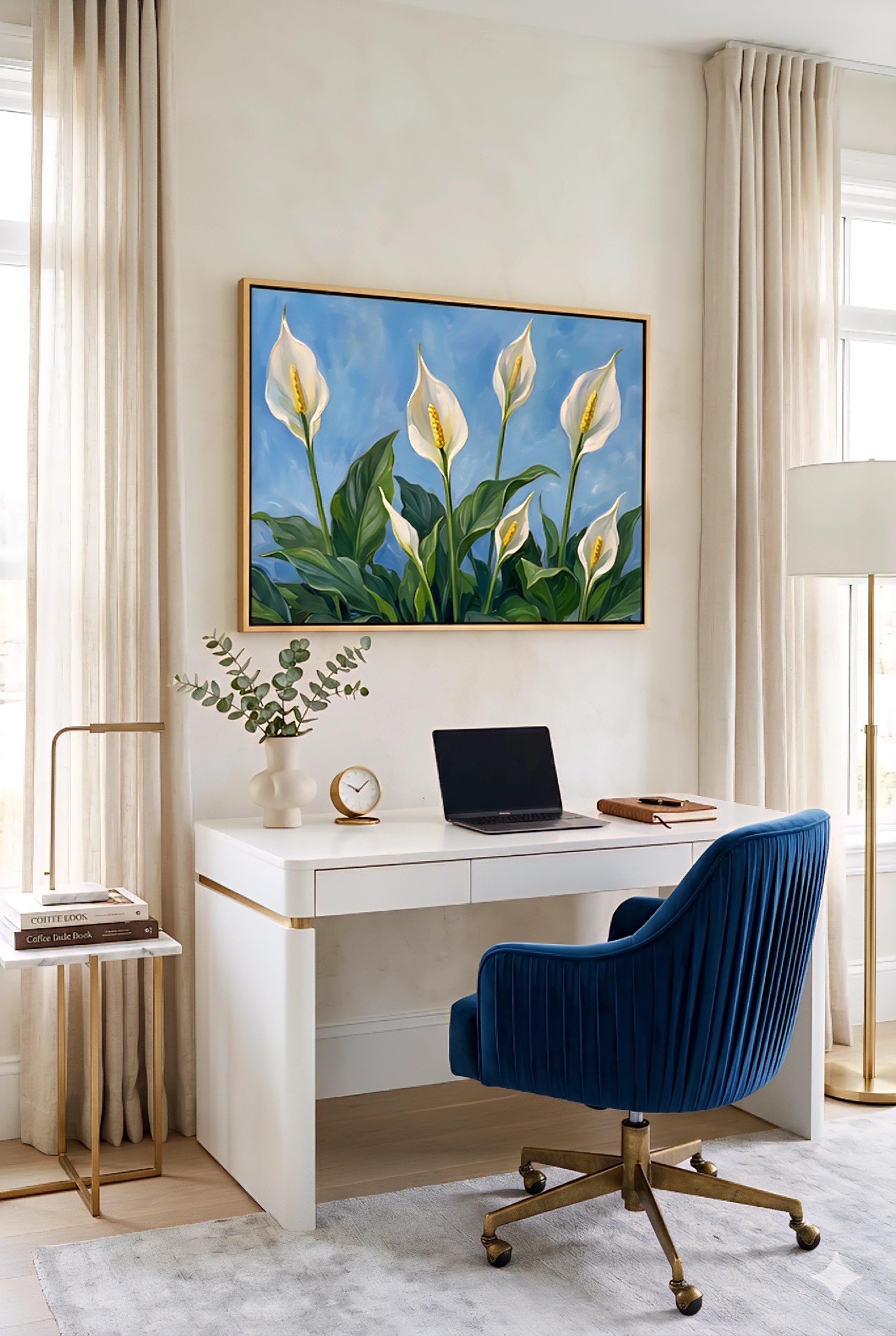 Framed peace lily botanical wall art with white blooms and green leaves on a blue background styled above a desk in a modern home office, printable digital download