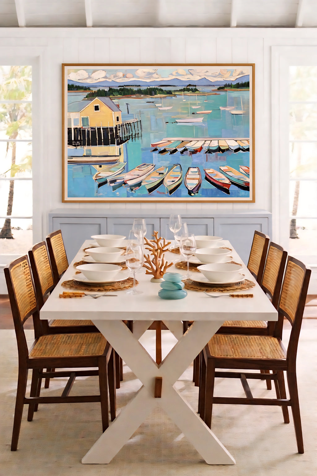 Coastal harbor printable wall art digital download in beach dining room with white table and natural wood chairs