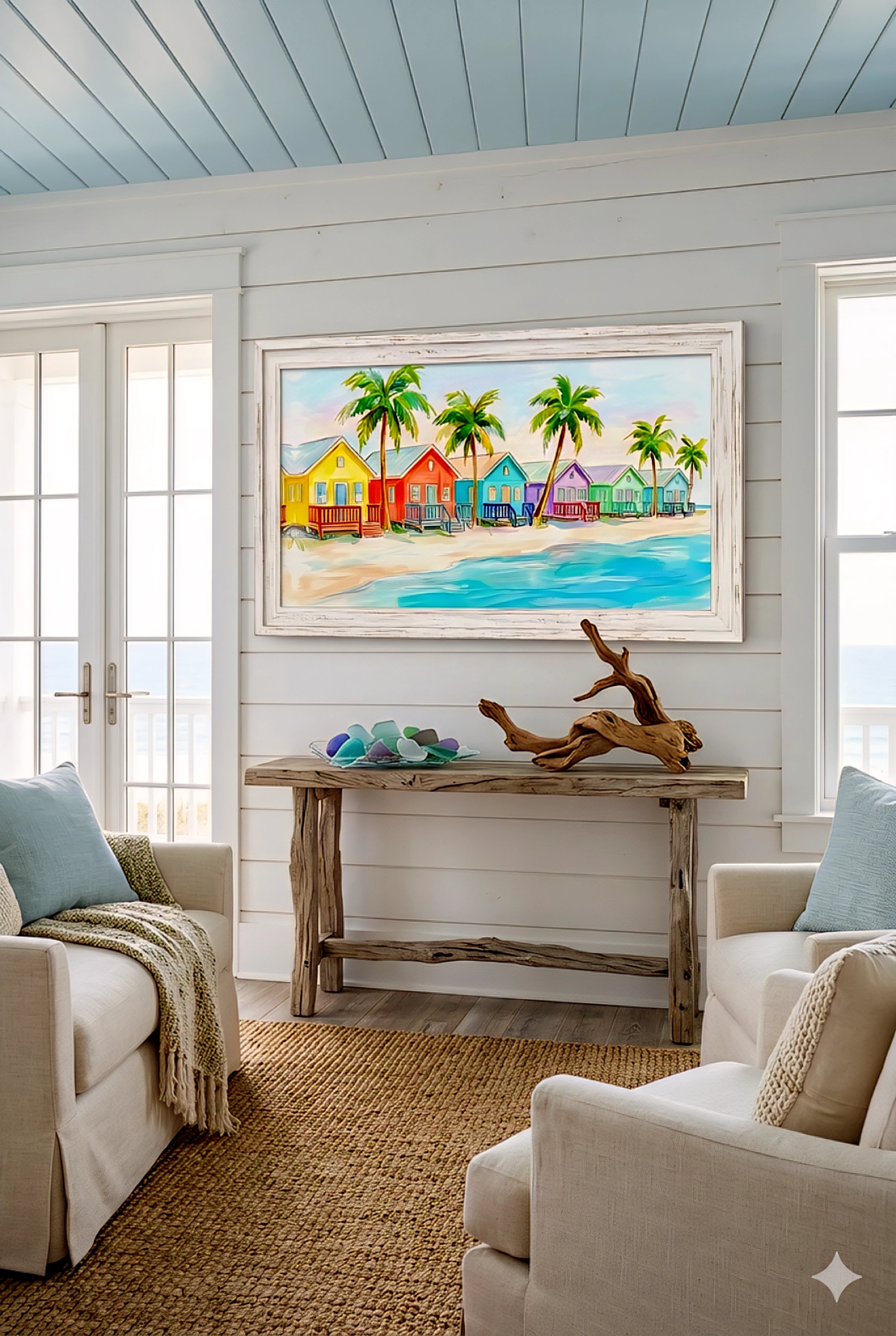 Colorful beach houses digital wall art in coastal living room, tropical palm tree ocean print framed above console table for bright beach home decor