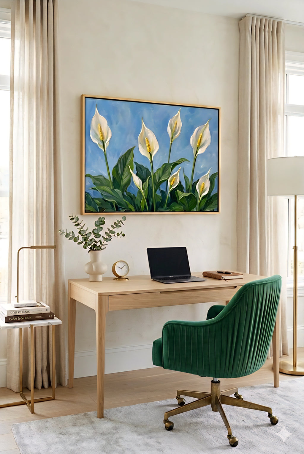 Framed peace lily botanical wall art with white blooms and green leaves on a blue background styled above a desk in a modern home office with a green chair, printable digital download