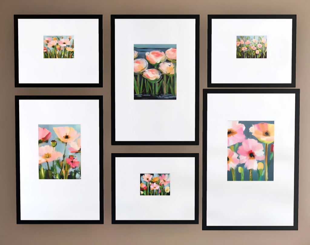 Set of framed floral paintings on a wall