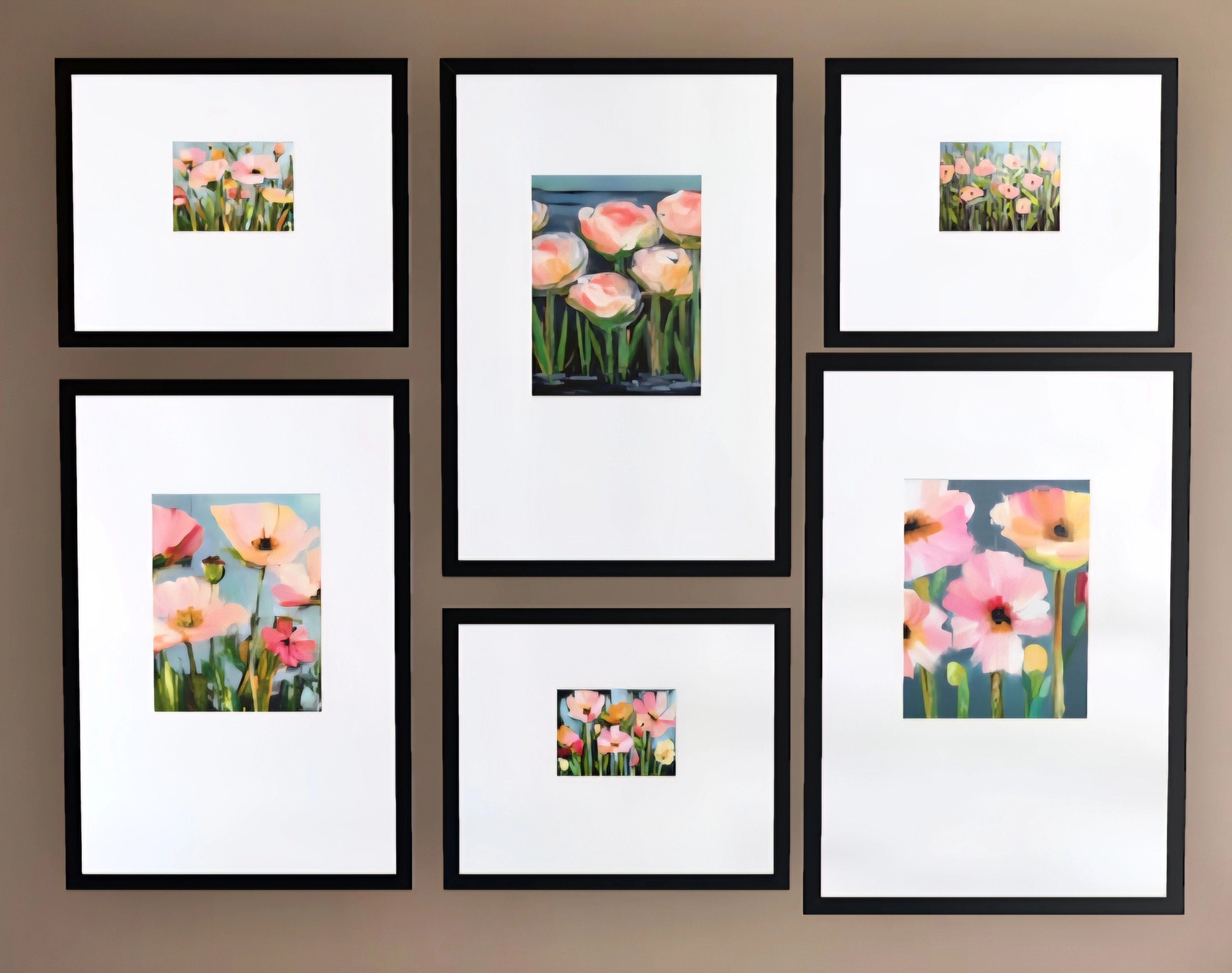 Set of framed floral paintings on a wall