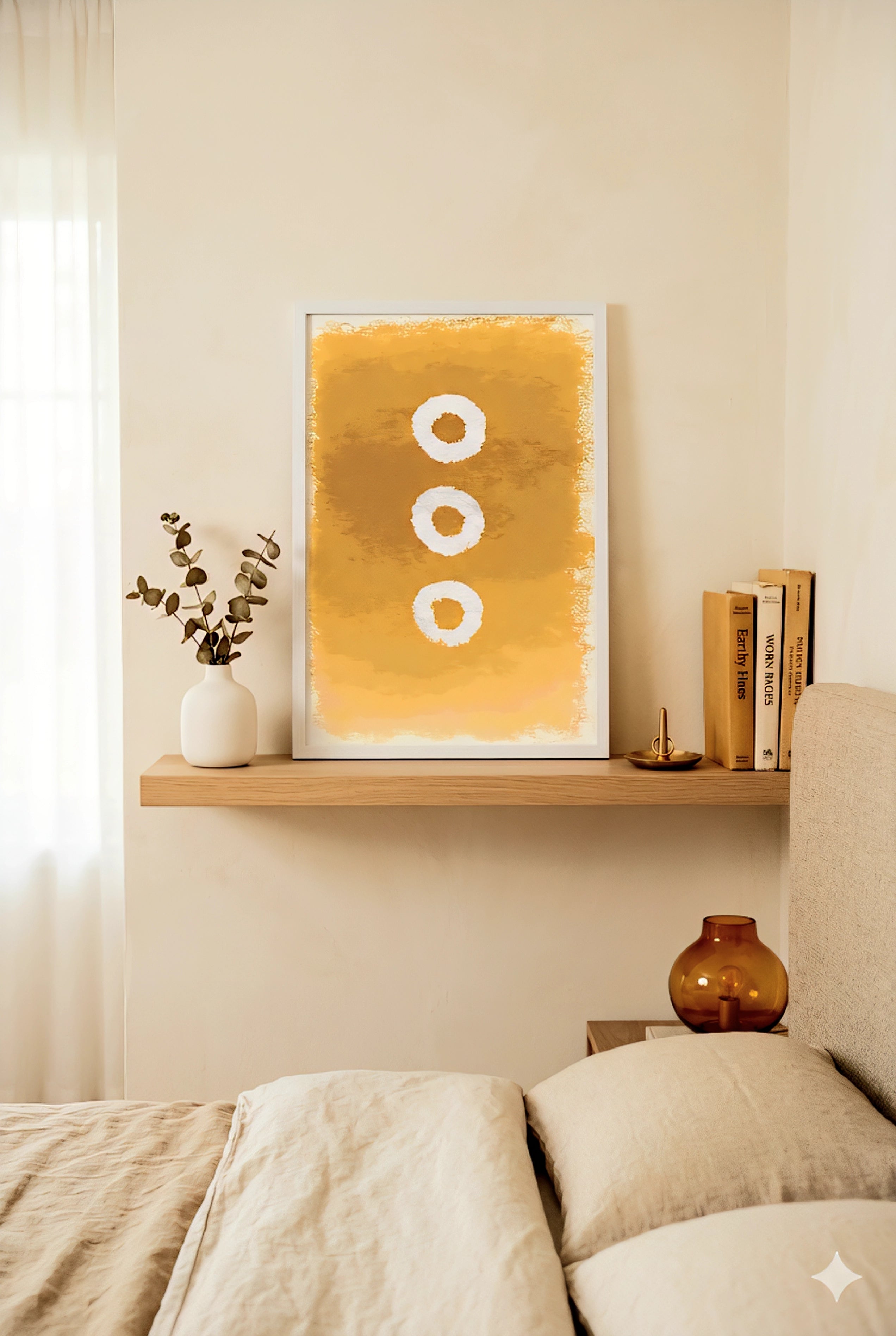 Large abstract wall art printable in warm golden earth tones with three circular shapes, displayed on a floating wood shelf above a bed in a modern minimalist bedroom, 9:16 vertical wall decor