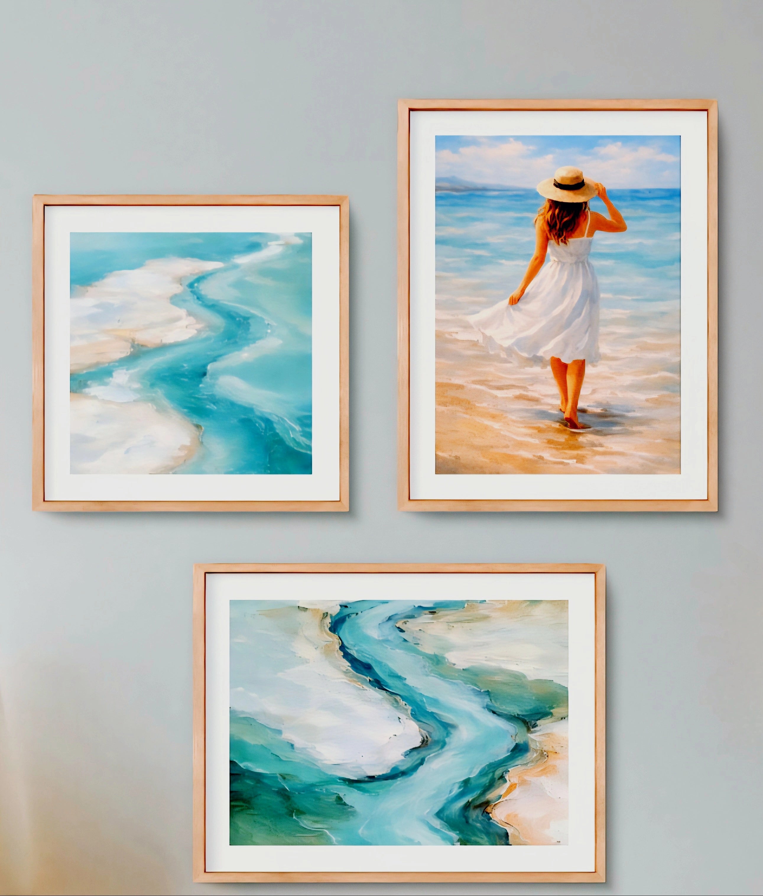 Gallery wall features coastal subjects.
